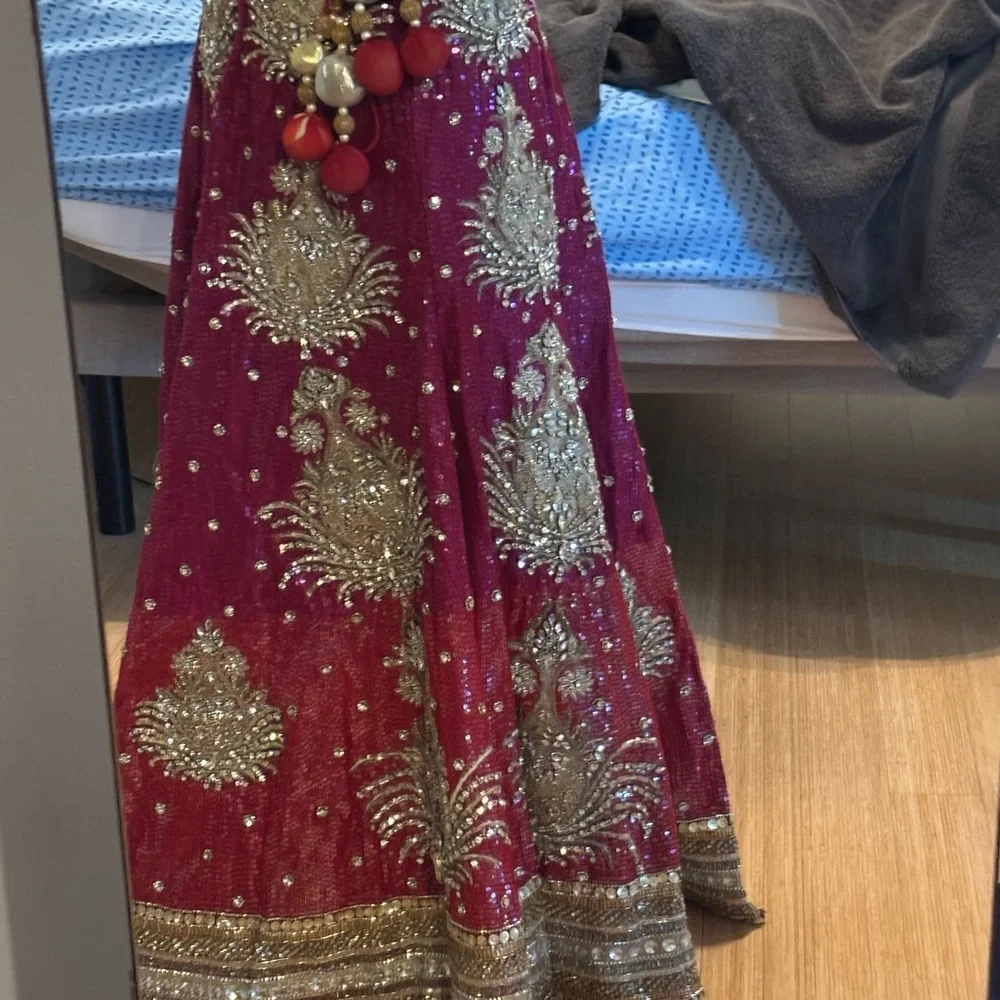 Gyans Elegant Magenta and Gold Embellished Lehenga Set - Picture 2 of 16